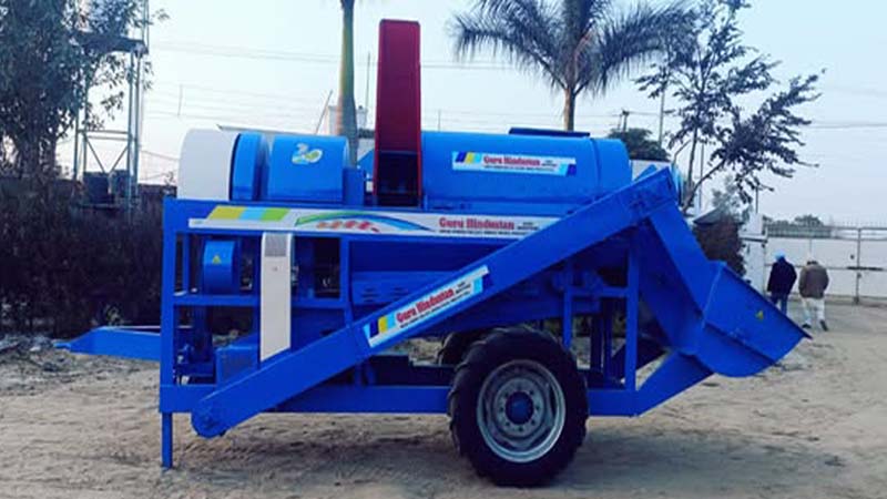 Back tokri thresher in a field